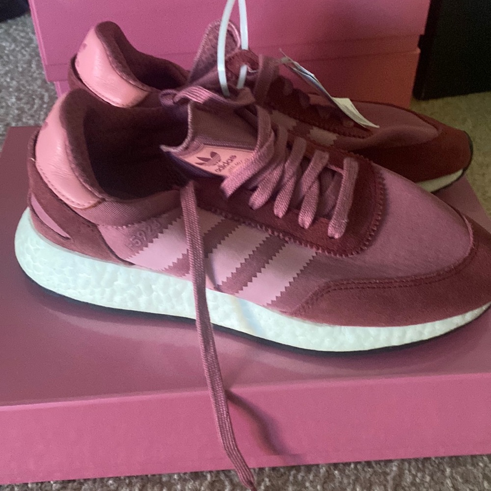 Never worn Adidas shoes. Brand New! Super cute with a jogger suit.